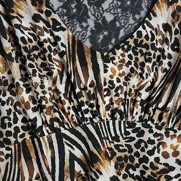 💙5/$20💙 SLIMPACT.. leopard print top.. - Picture 6 of 13